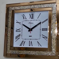 ساعت دیواری آینه ای نگین دار مربع مدل لوکس بسیار زیبا و جذاب در دو رنگ مختلف نقره ای و برنز قطر 60 سانت